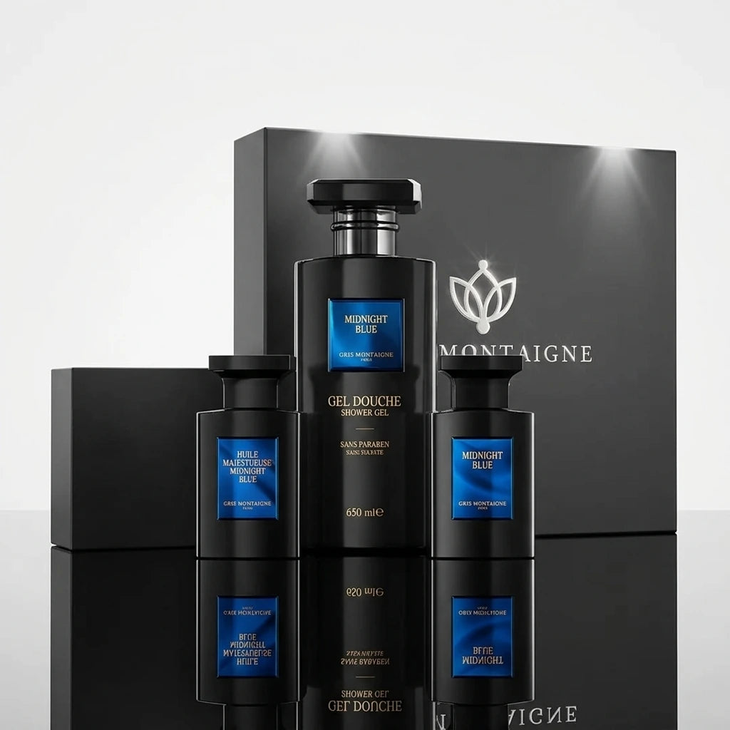 Un plan moyen de face respectant la composition exacte de image_20c739.jpg : le grand coffret cadeau noir se dresse majestueusement en arrière-plan, tandis que le flacon de gel douche de 650 ml et les deux flacons de parfum de image_20c739.jpg sont disposés avec symétrie à l'avant sur une surface lisse et noire laquée. Le sol crée un reflet miroir net et impeccable sous chaque élément. Style : Packshot commercial haut de gamme. (gemini-3.1-flash-image-preview)
