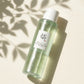 Angle face  Beauty of Joseon Green Plum Refreshing Toner on soft ivory background with delicate leaf shadows projected by sunlight, minimalist Korean skincare aesthetic, realistic shadows, premium beauty campaign, luxury commercial photography. (gemini-3-pro-image-preview)